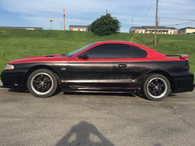 1994 Red over Black with Charcoal pinstripe Ford Mustang