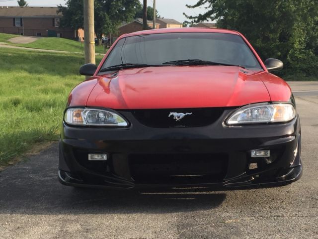 1994 Red over Black with Charcoal pinstripe Ford Mustang