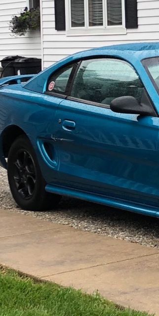 1994 Teal metallic Ford Mustang Coupe