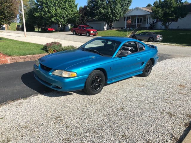 1994 Teal metallic Ford Mustang Coupe