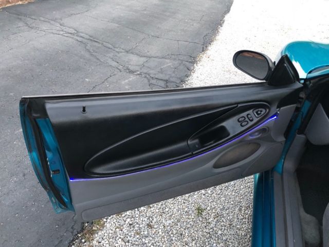 1994 Teal metallic Ford Mustang Coupe