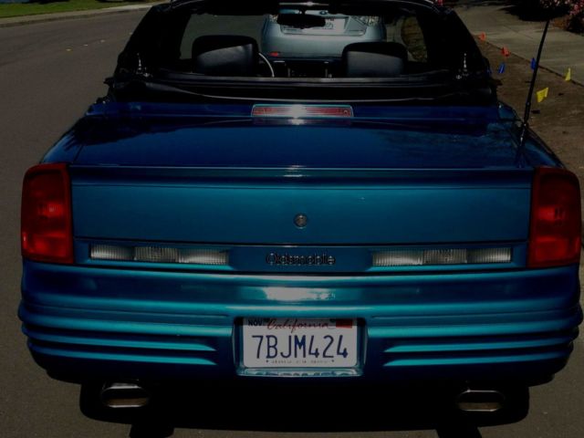 1994 Teal Oldsmobile Cutlass Convertible