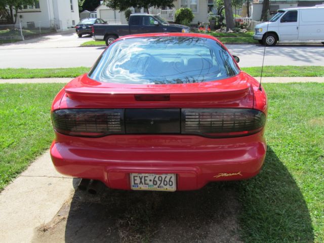 1994 Red Pontiac Firebird Coupe