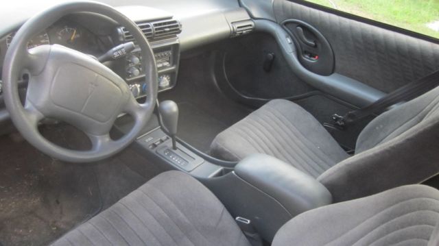 1994 Green Pontiac Grand Am Coupe