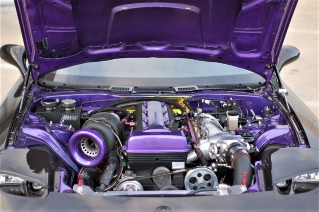 1994 Ebony Chestnut Metallic Mazda RX-7 Coupe