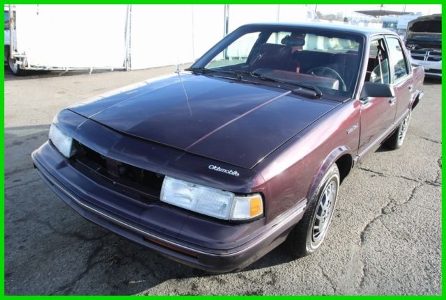 1994 Red Oldsmobile Cutlass Sedan