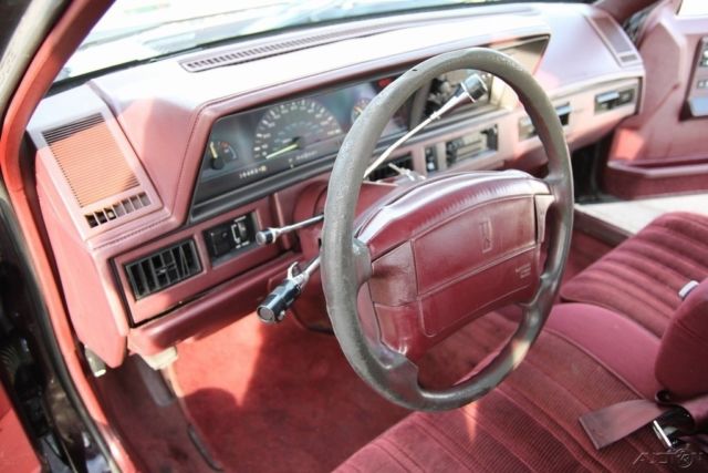 1994 Red Oldsmobile Cutlass Sedan