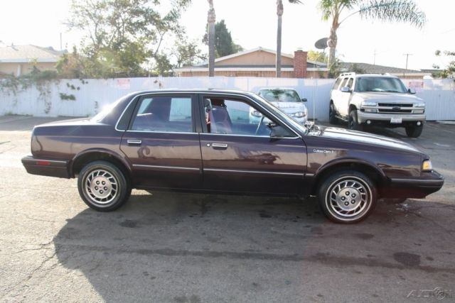 1994 Red Oldsmobile Cutlass Sedan
