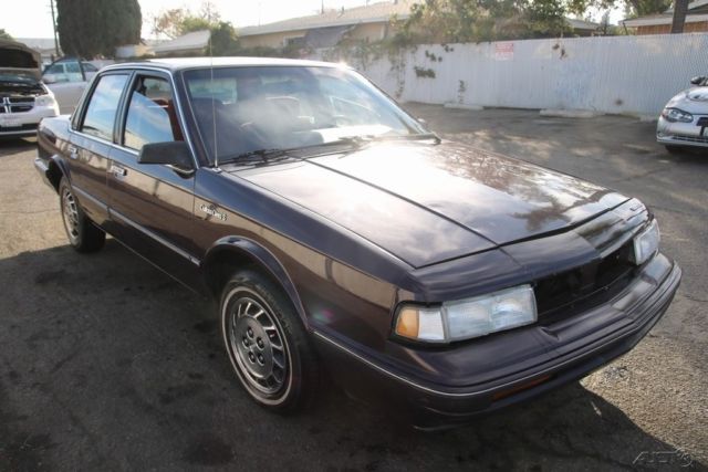 1994 Red Oldsmobile Cutlass Sedan