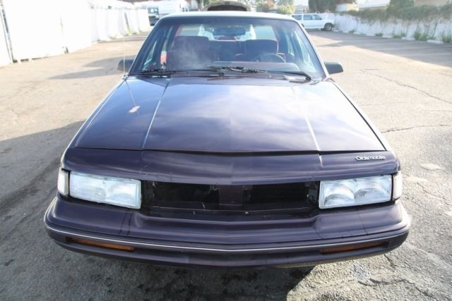 1994 Red Oldsmobile Cutlass Sedan