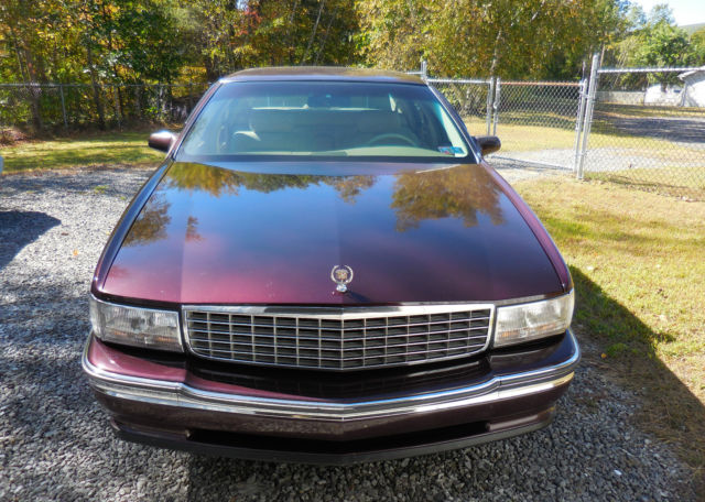 1994 Burgundy Cadillac DeVille Sedan