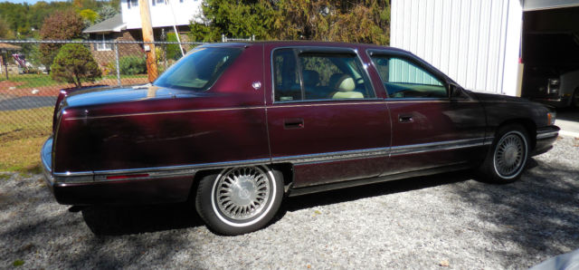 1994 Burgundy Cadillac DeVille Sedan