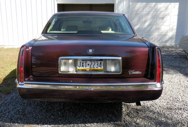1994 Burgundy Cadillac DeVille Sedan