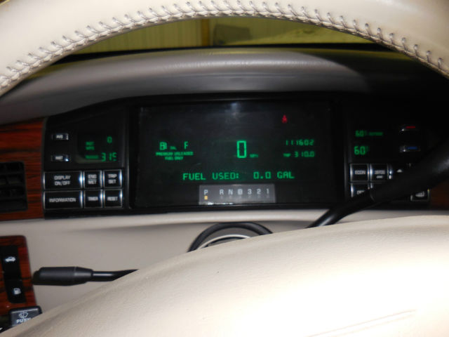 1994 Burgundy Cadillac DeVille Sedan