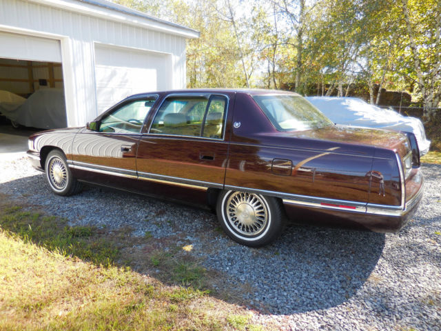 1994 Burgundy Cadillac DeVille Sedan