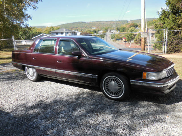 1994 Burgundy Cadillac DeVille Sedan