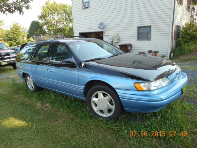 1994 Blue/Black Ford Taurus Wagon