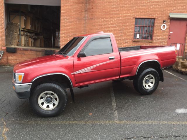 1994 Burgundy Toyota Tacoma pickup