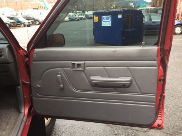 1994 Burgundy Toyota Tacoma pickup