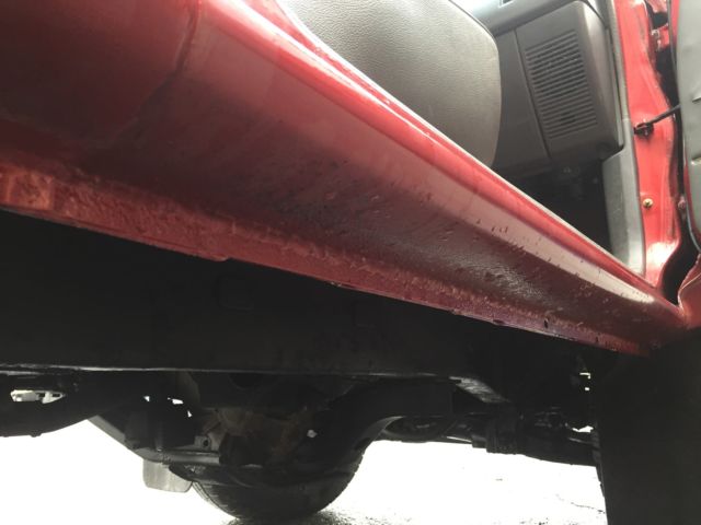 1994 Burgundy Toyota Tacoma pickup