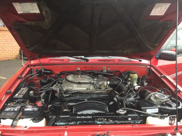 1994 Burgundy Toyota Tacoma pickup