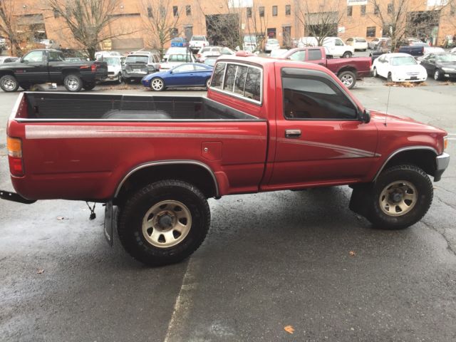 1994 Burgundy Toyota Tacoma pickup