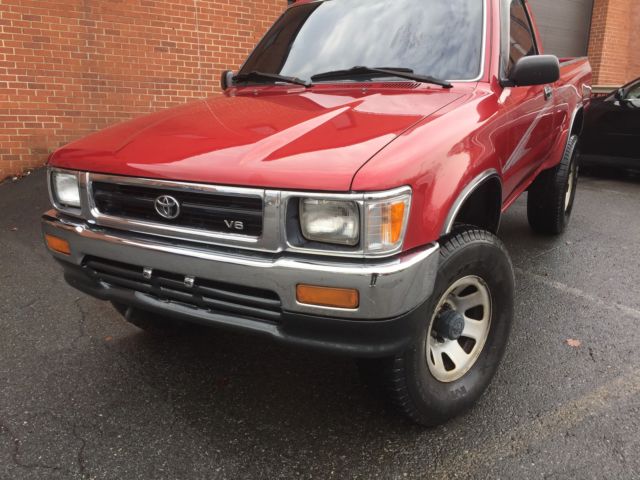 1994 Burgundy Toyota Tacoma pickup