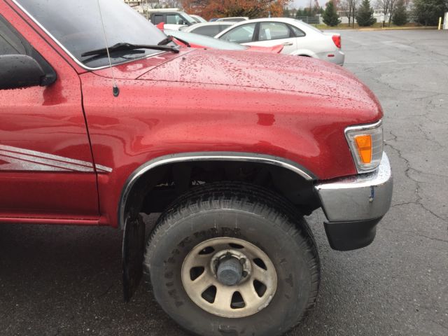 1994 Burgundy Toyota Tacoma pickup