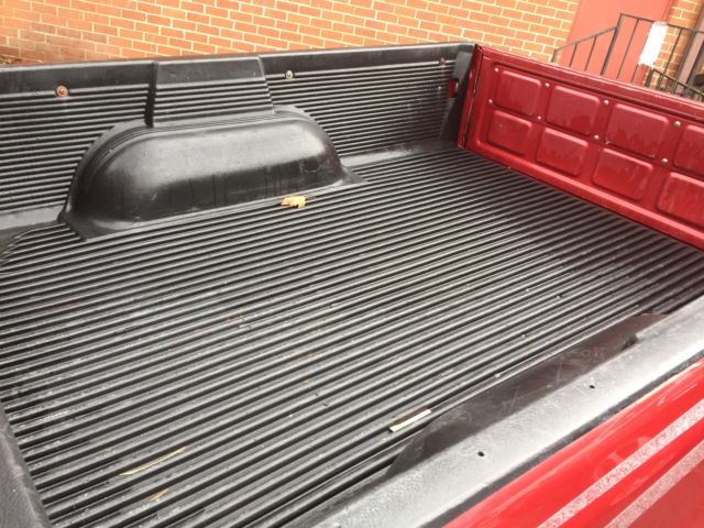 1994 Burgundy Toyota Tacoma pickup