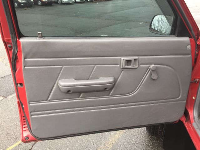 1994 Burgundy Toyota Tacoma pickup