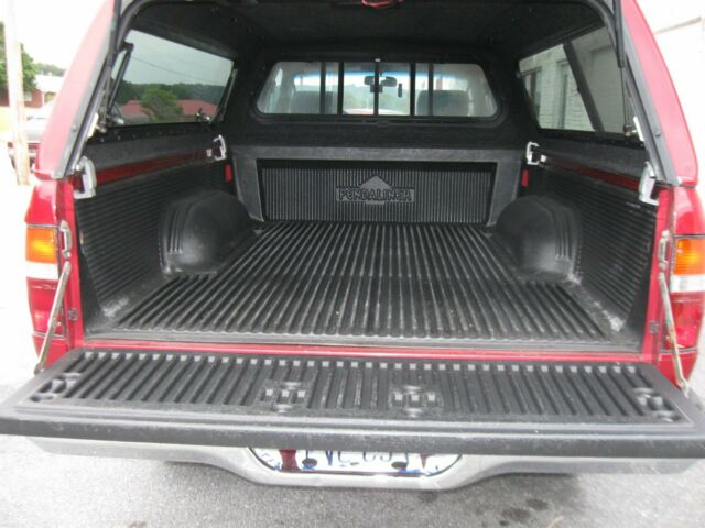 1994 Burgundy Toyota Tacoma Extended Cab Pickup