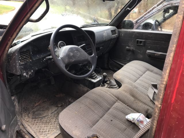 1994 maroon Toyota pickup Standard Cab Pickup