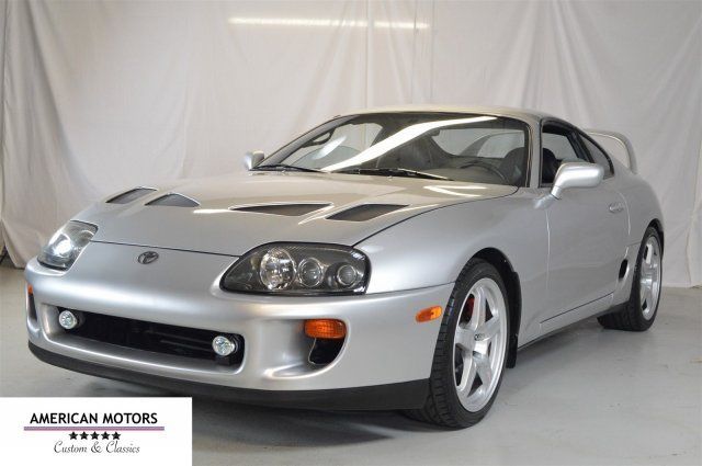 1994 Silver Toyota Supra --