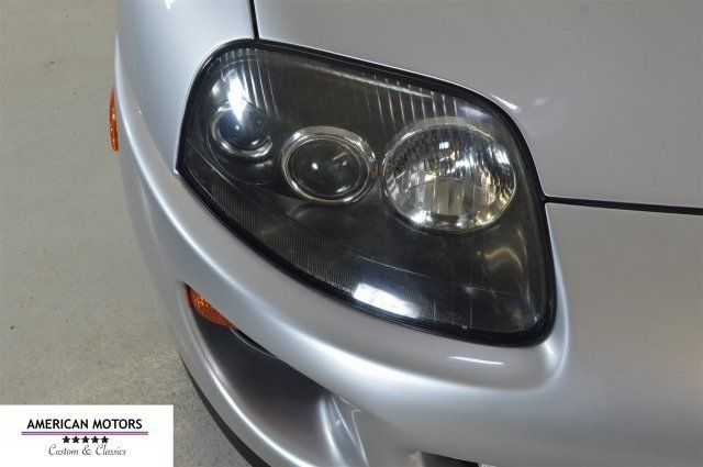 1994 Silver Toyota Supra --