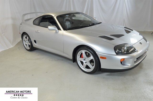 1994 Silver Toyota Supra --