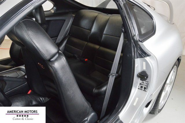 1994 Silver Toyota Supra --