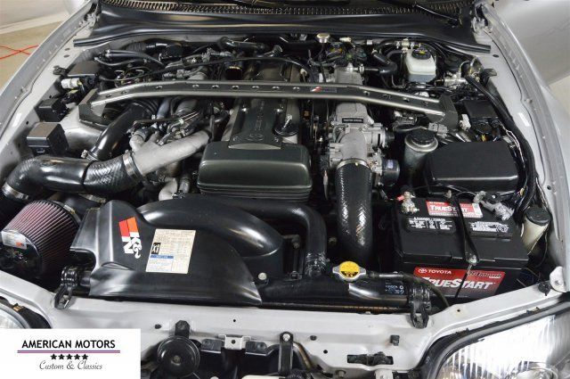 1994 Silver Toyota Supra --