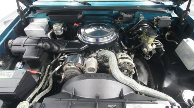 1994 Teal GMC Sierra 1500 Pickup Truck