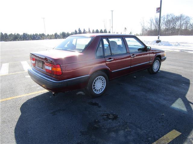 1994 Maroon Volvo 900 --