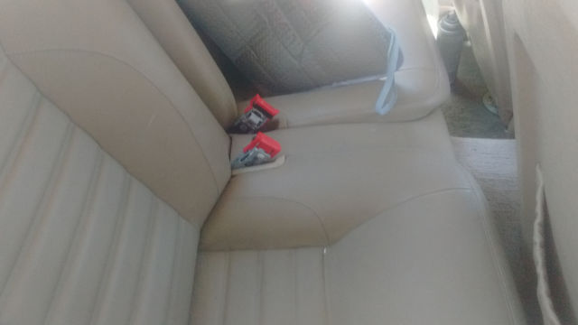 1994 metalic burgandy Jaguar XJS Coupe