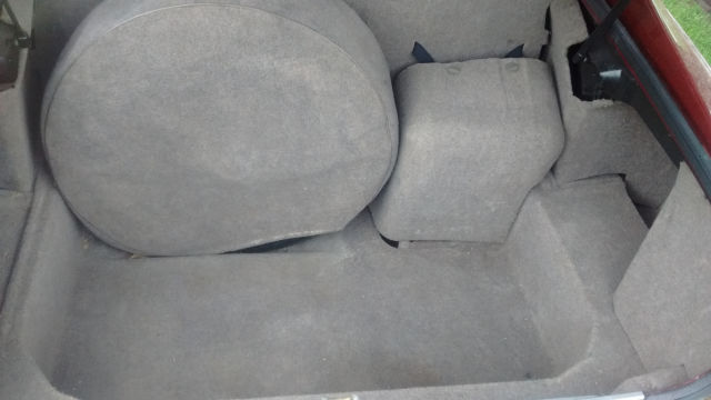 1994 metalic burgandy Jaguar XJS Coupe