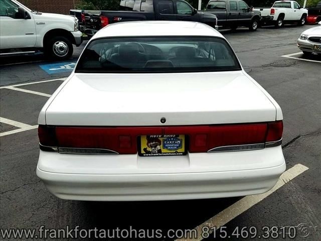 1994 White Mercury Cougar Coupe