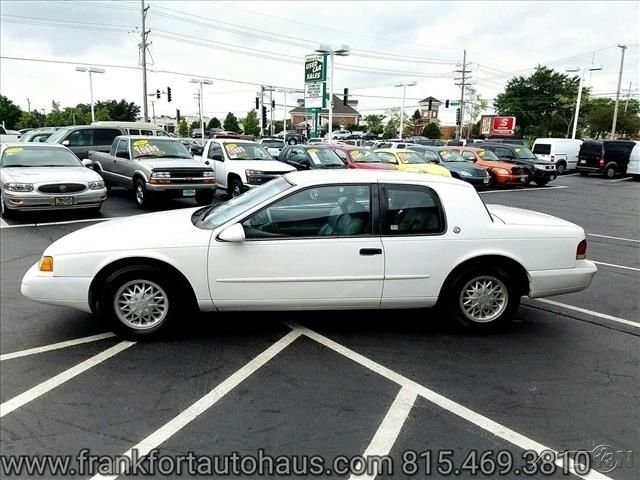 1994 White Mercury Cougar Coupe