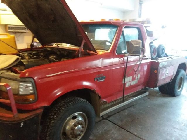 1993 red Ford Tow Truck