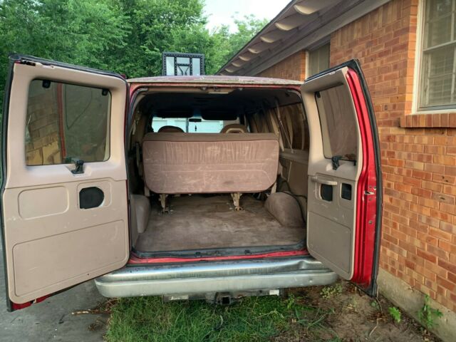 1985 Red Ford E-Series Van