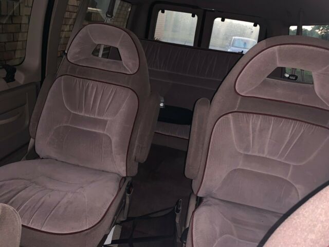 1985 Red Ford E-Series Van