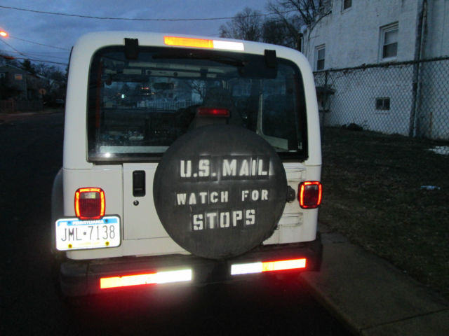 1977 White Jeep Wrangler