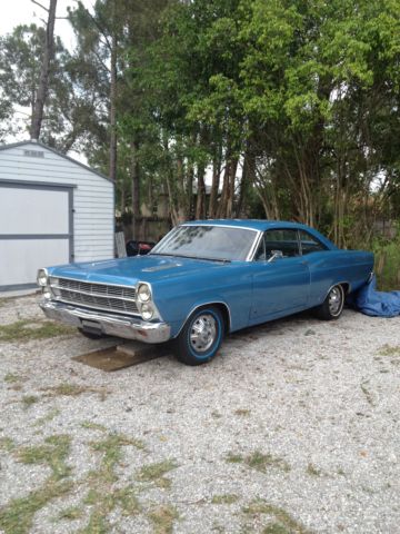 1966 one red and other blue Ford Fairlane 2 door hard tops