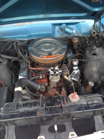 1966 one red and other blue Ford Fairlane 2 door hard tops