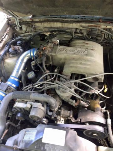 1991 red Ford Mustang foxbody